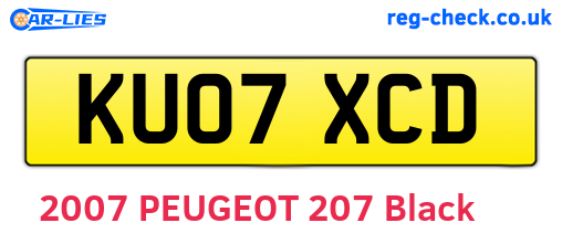 KU07XCD are the vehicle registration plates.