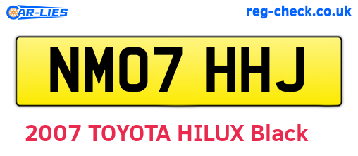 NM07HHJ are the vehicle registration plates.