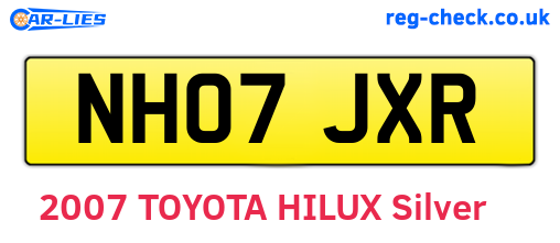 NH07JXR are the vehicle registration plates.