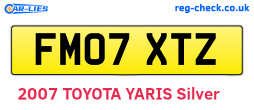 FM07XTZ are the vehicle registration plates.