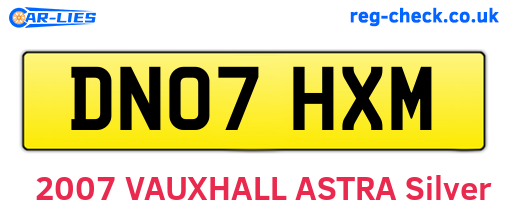 DN07HXM are the vehicle registration plates.