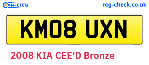 KM08UXN are the vehicle registration plates.