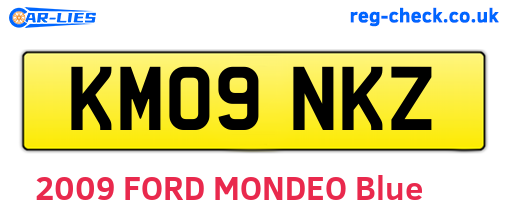 KM09NKZ are the vehicle registration plates.