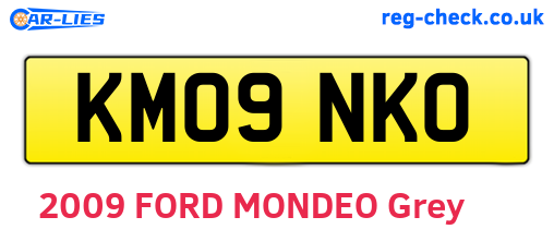 KM09NKO are the vehicle registration plates.