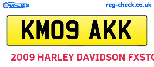 KM09AKK are the vehicle registration plates.