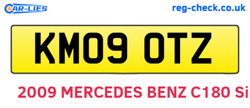 KM09OTZ are the vehicle registration plates.