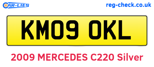 KM09OKL are the vehicle registration plates.