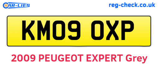 KM09OXP are the vehicle registration plates.