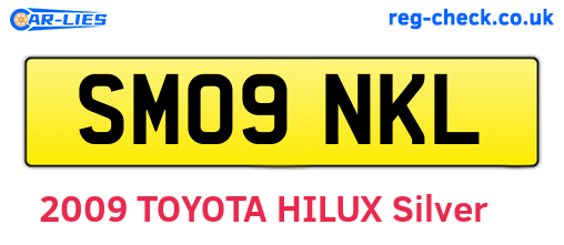 SM09NKL are the vehicle registration plates.
