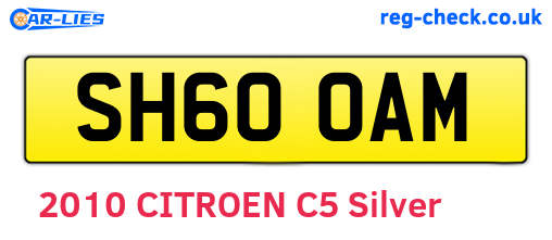 SH60OAM are the vehicle registration plates.