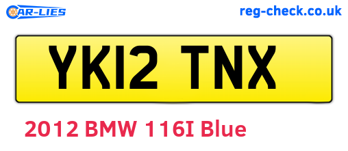 YK12TNX are the vehicle registration plates.
