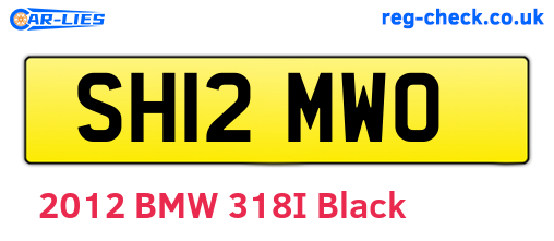 SH12MWO are the vehicle registration plates.