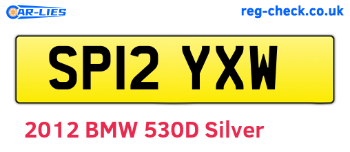 SP12YXW are the vehicle registration plates.