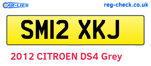 SM12XKJ are the vehicle registration plates.