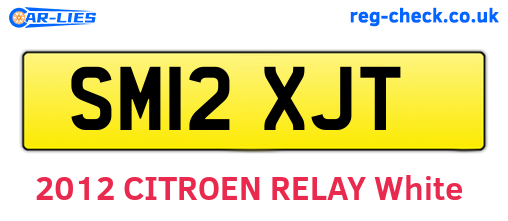 SM12XJT are the vehicle registration plates.