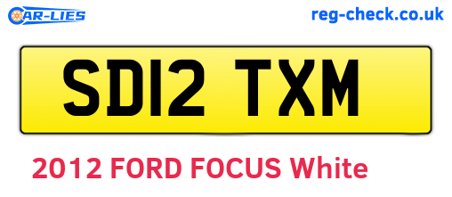 SD12TXM are the vehicle registration plates.