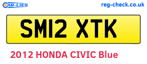 SM12XTK are the vehicle registration plates.