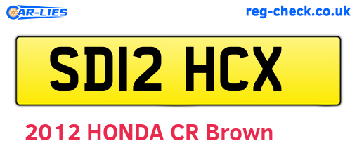 SD12HCX are the vehicle registration plates.