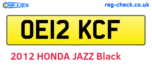 OE12KCF are the vehicle registration plates.