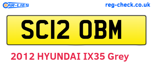 SC12OBM are the vehicle registration plates.