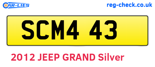 SCM443 are the vehicle registration plates.