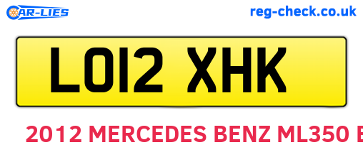 LO12XHK are the vehicle registration plates.