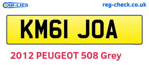 KM61JOA are the vehicle registration plates.