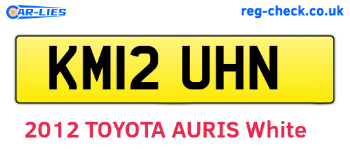 KM12UHN are the vehicle registration plates.