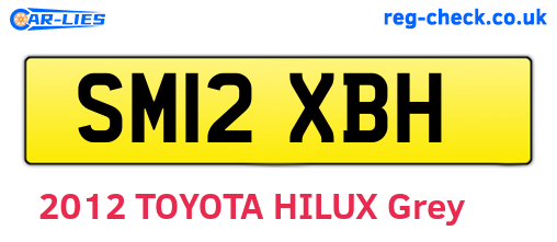 SM12XBH are the vehicle registration plates.