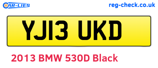 YJ13UKD are the vehicle registration plates.