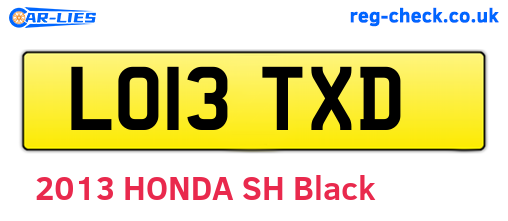 LO13TXD are the vehicle registration plates.