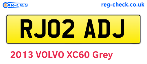 RJ02ADJ are the vehicle registration plates.