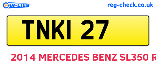 TNK127 are the vehicle registration plates.