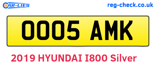 OO05AMK are the vehicle registration plates.