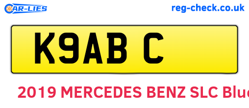 K9ABC are the vehicle registration plates.